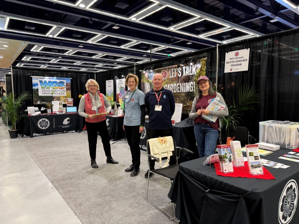 Master Gardener volunteers ready to talk to guests at the NWFGF in Seattle.