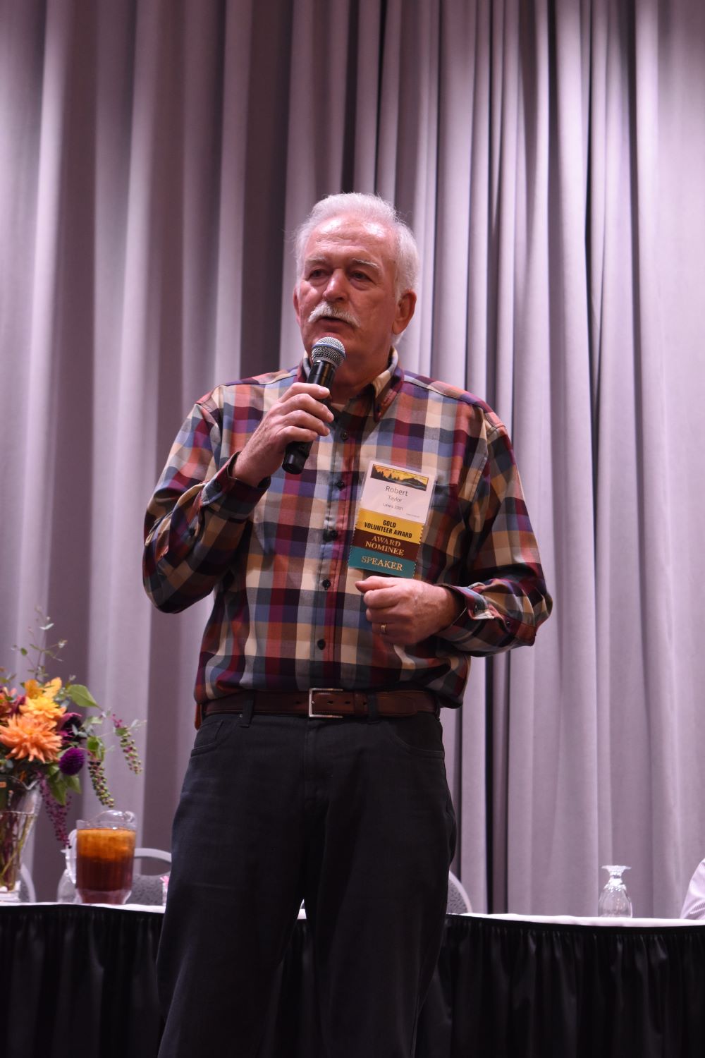 Bob Taylor speaking at conference.