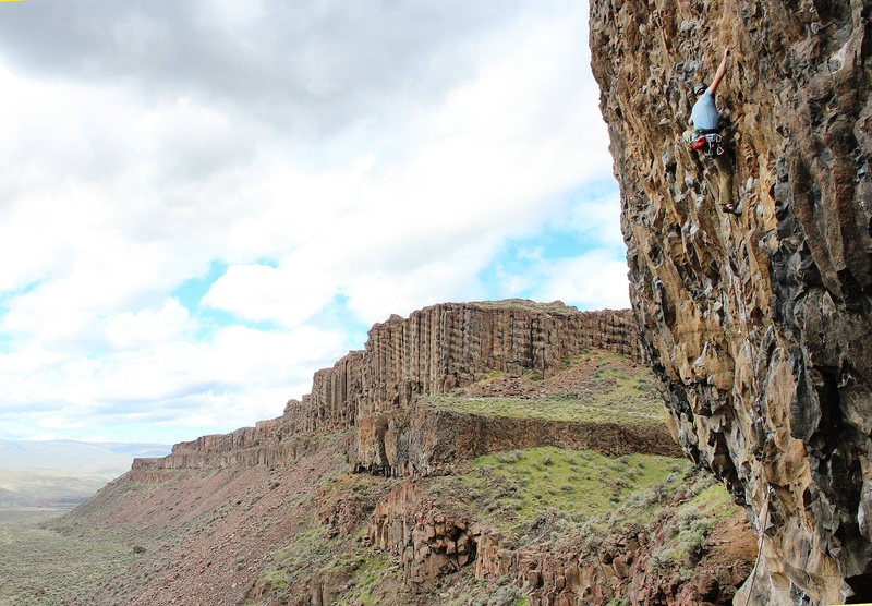 climber on a rock face.