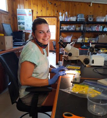 Jill using in microscope