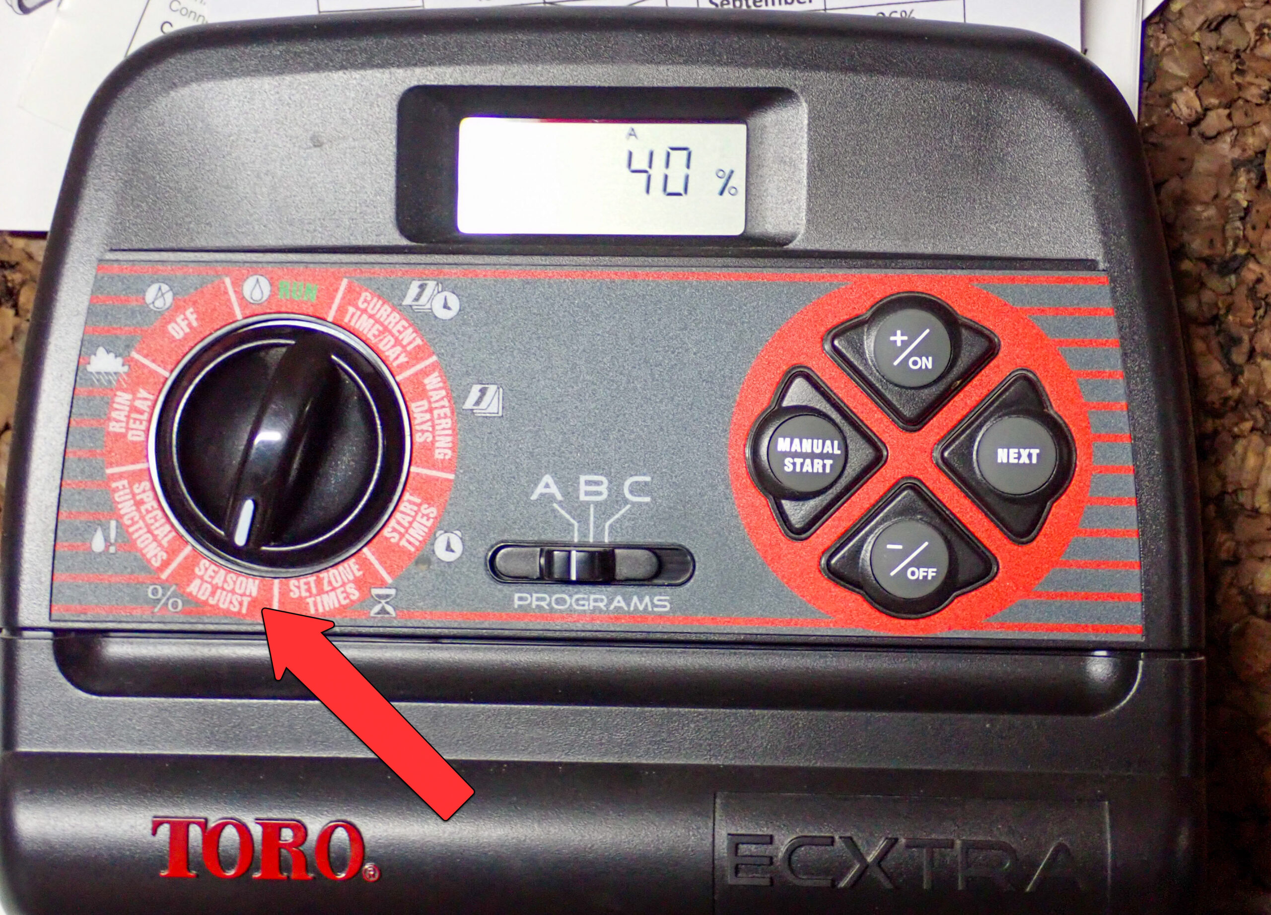 A Toro brand sprinkler irrigation controller showing the "Season Adjust" setting.