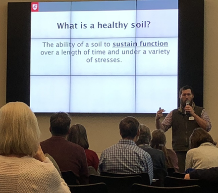 Speaker at the annual symposium discussing relevant topics