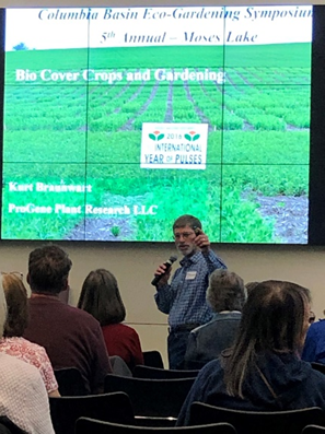 Speaker at the annual symposium discussing relevant topics