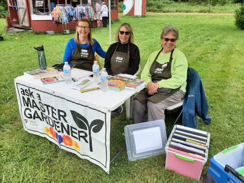 Master Gardeners at a clinic table