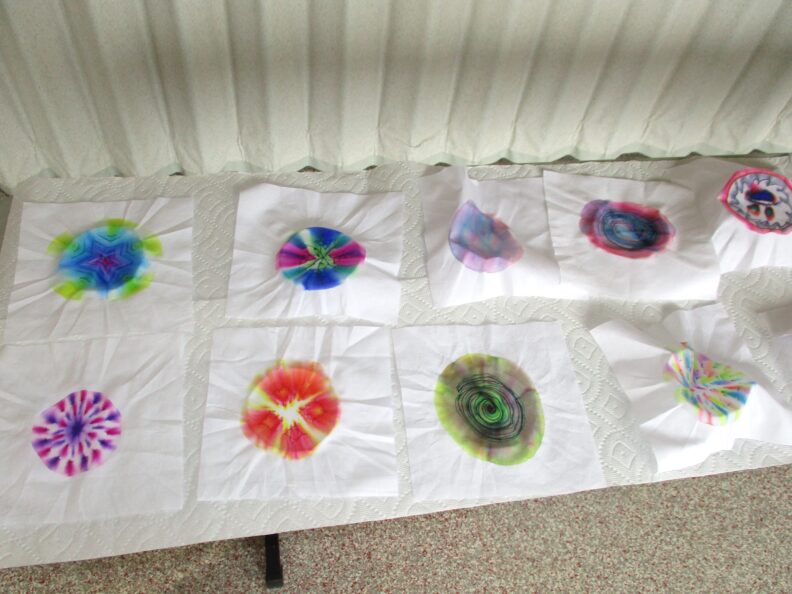 Some projects made in the sharpie tie dye workshop.