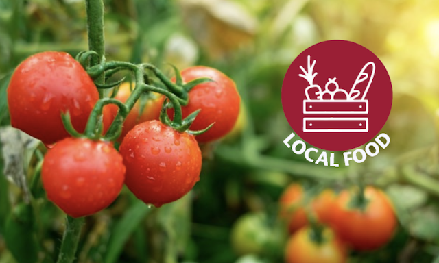 Tomatoes on the vine with Local Food spirit mark