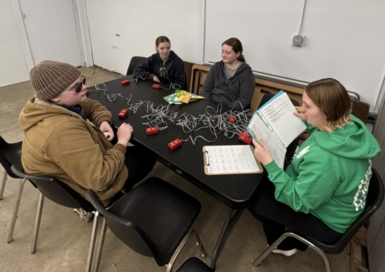 Youth members practicing Cat Knowledge Bowl