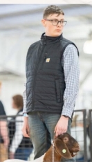 Youth member showing goat