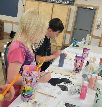 Youth preparing for the fair