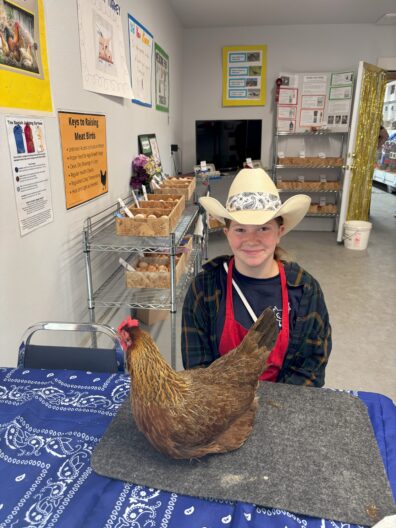 PC Fair - youth with a chicken