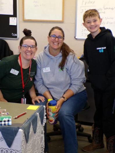 PC Fair - volunteers with youth member