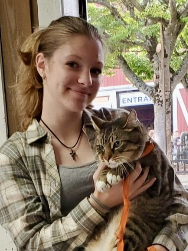 Girl holding her cat