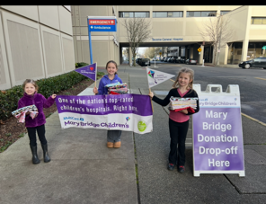 Youth members with their volunteer pillowcases they made.
