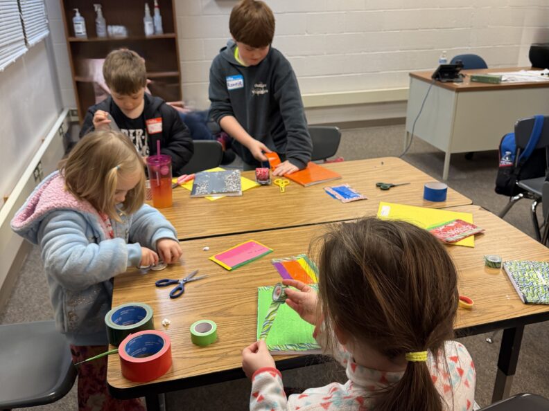 Youth members in a workshop at Super Saturday