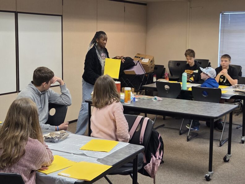 Youth members in a workshop at Super Saturday
