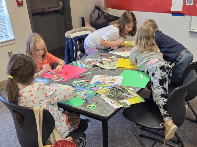 Youth members in a workshop at Super Saturday