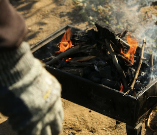 burning wood for biochar