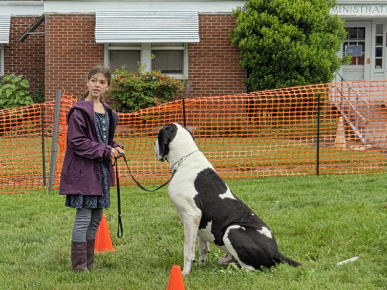 A 4-H Youth member with her dog