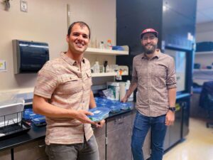 Two men in a laboratory.