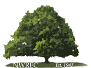 Illustration of a large oak tree. "NWREC Est. 1947"