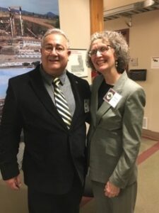Man and woman pose for a portrait.