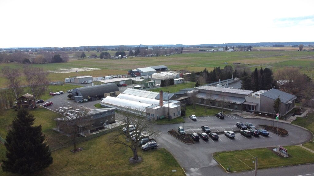 Aerial photo of buildings and parking lot.
