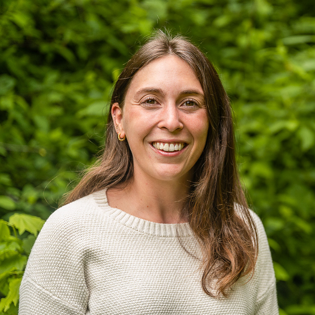 Autumn Maust smiling in an outdoor setting.