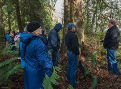 Volunteers listening to a talk