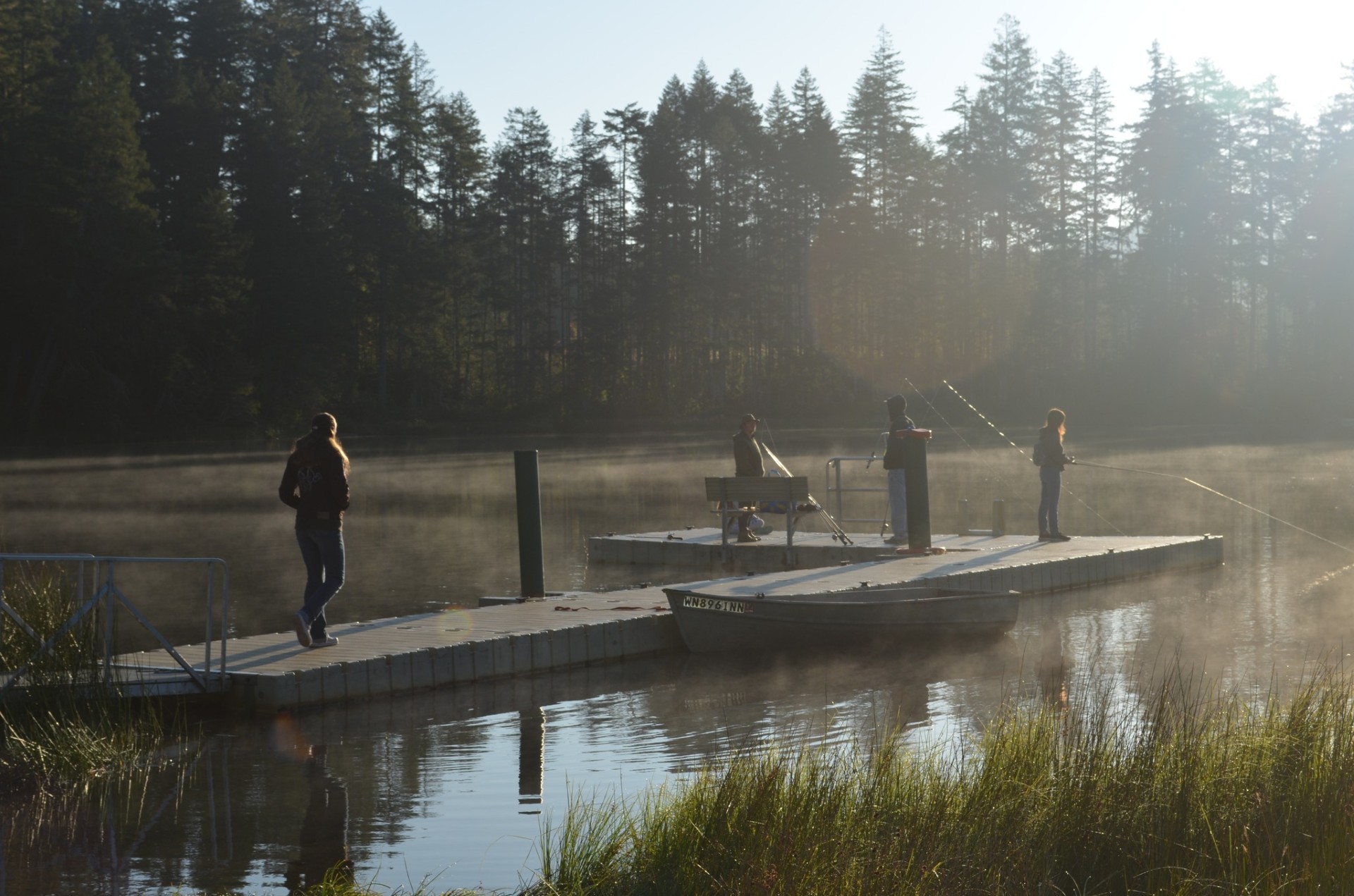 4H campers on dock fishing