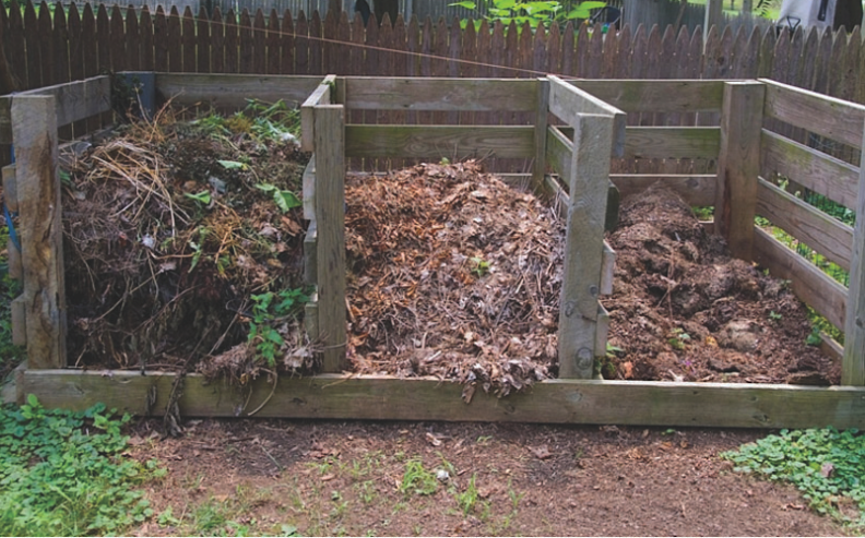 Multi Bin Composting setup. First bin has new material, Second bin has material decomposing, third bin is decomposed material now ready to apply as compost.