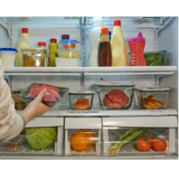 Image of Refrigerator with containers of prepped food for meal making
