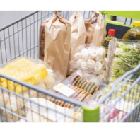 decorative: grocery cart with some food in it.