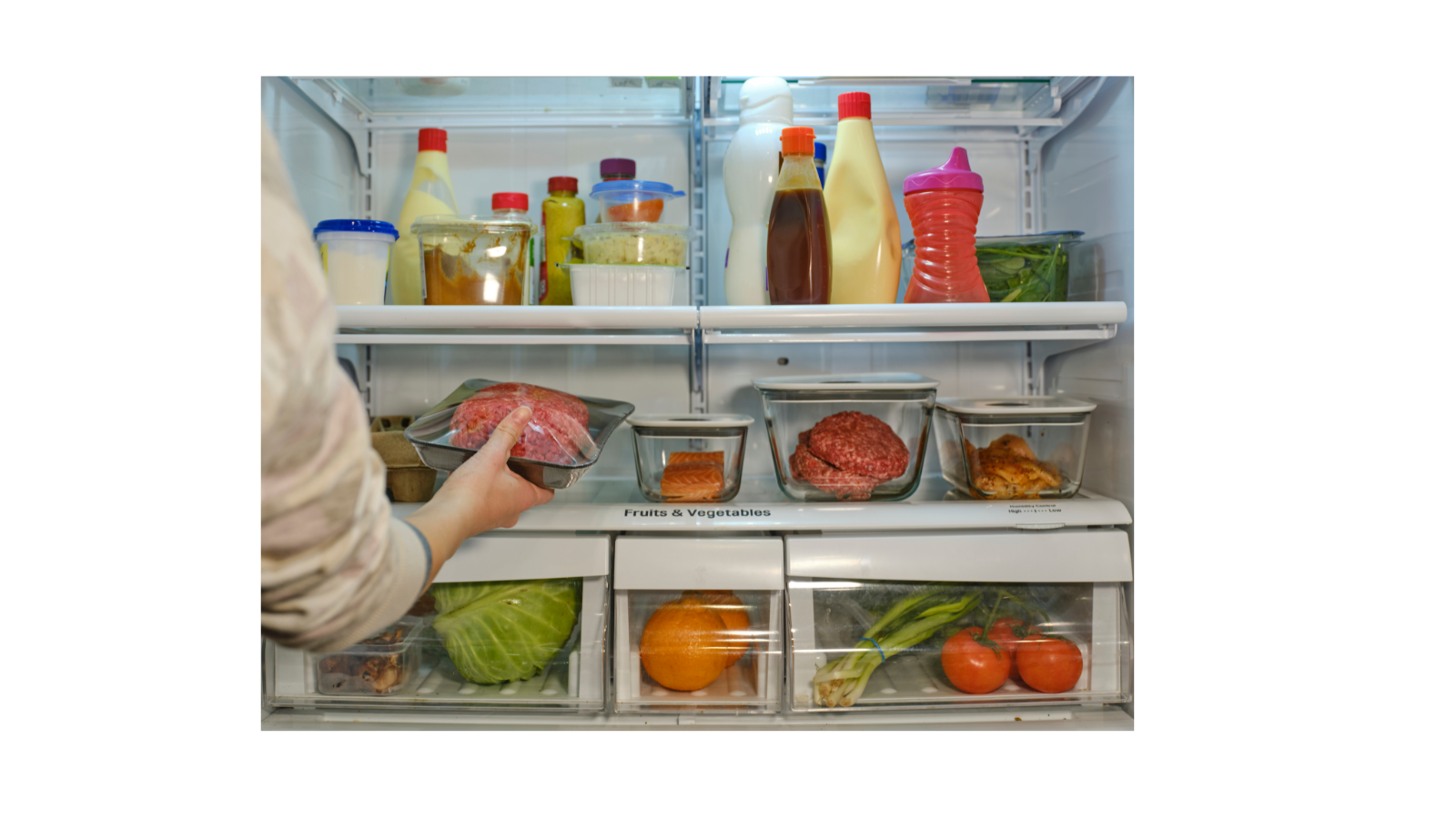 Image of Refrigerator with containers of prepped food for meal making