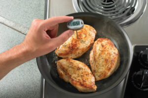 Image of Chicken cooking in pan