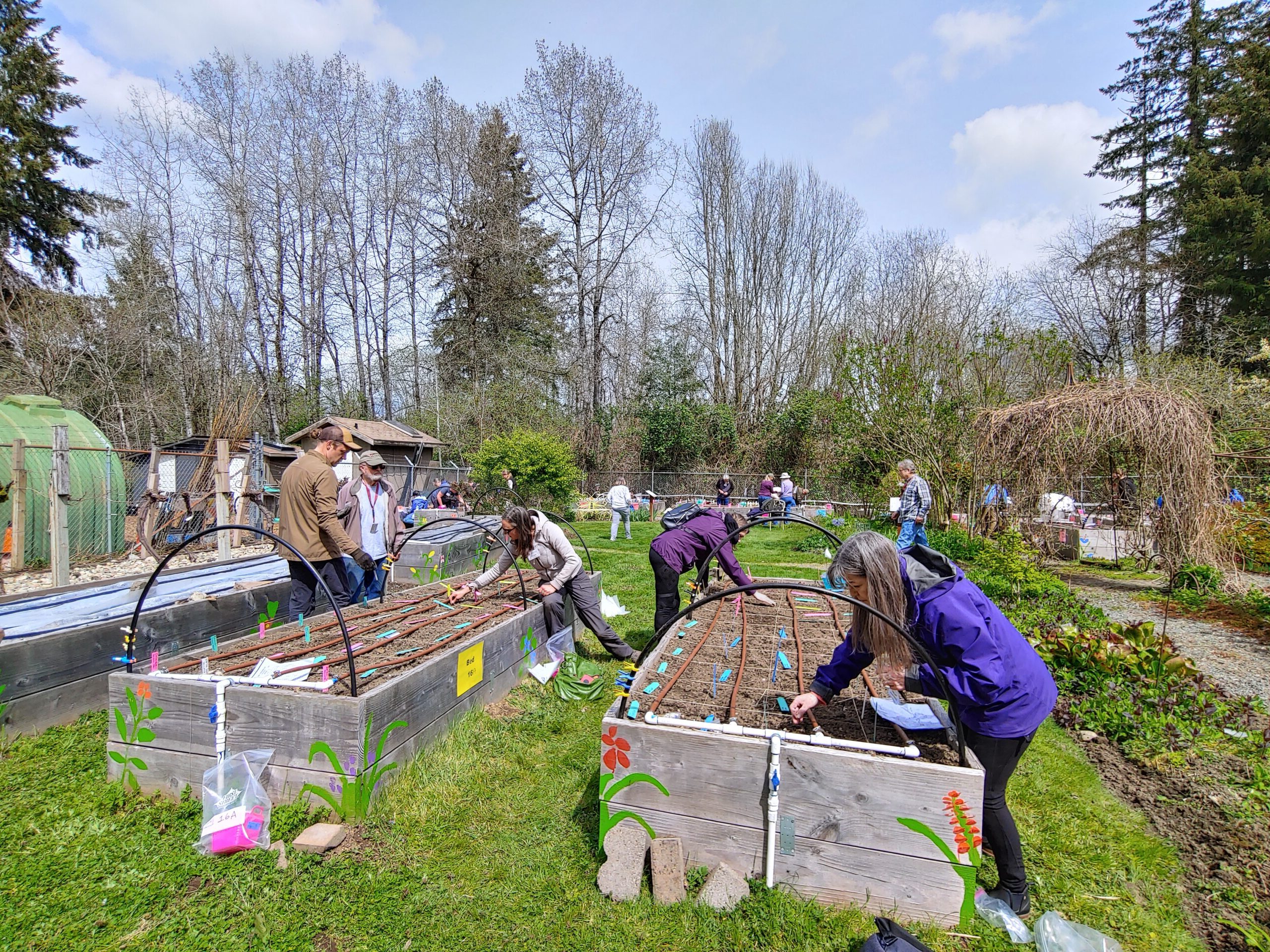 MG Trainees plant raised beds