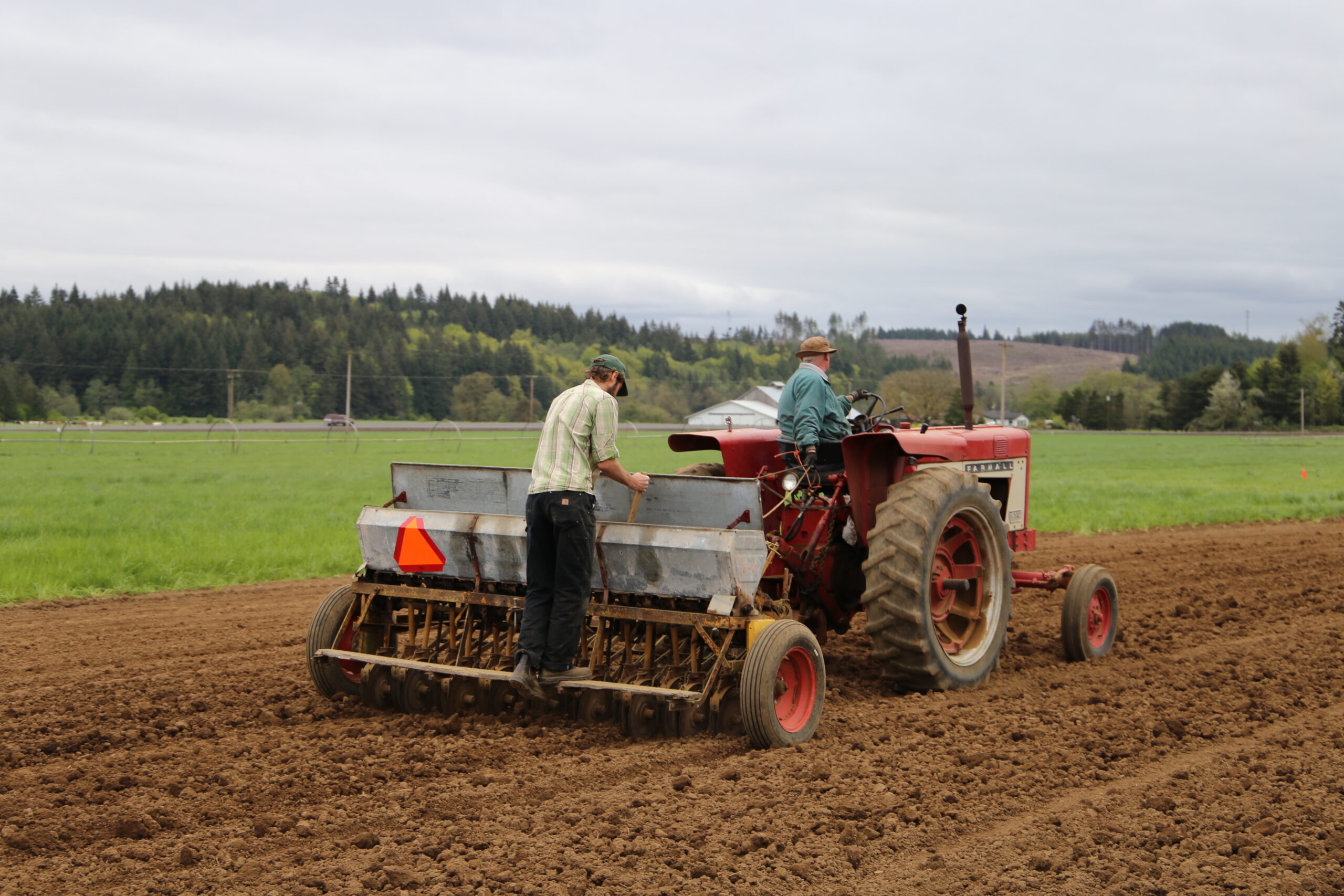 Tractor seeding a field