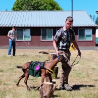 Photo of 4-H member and pack goat