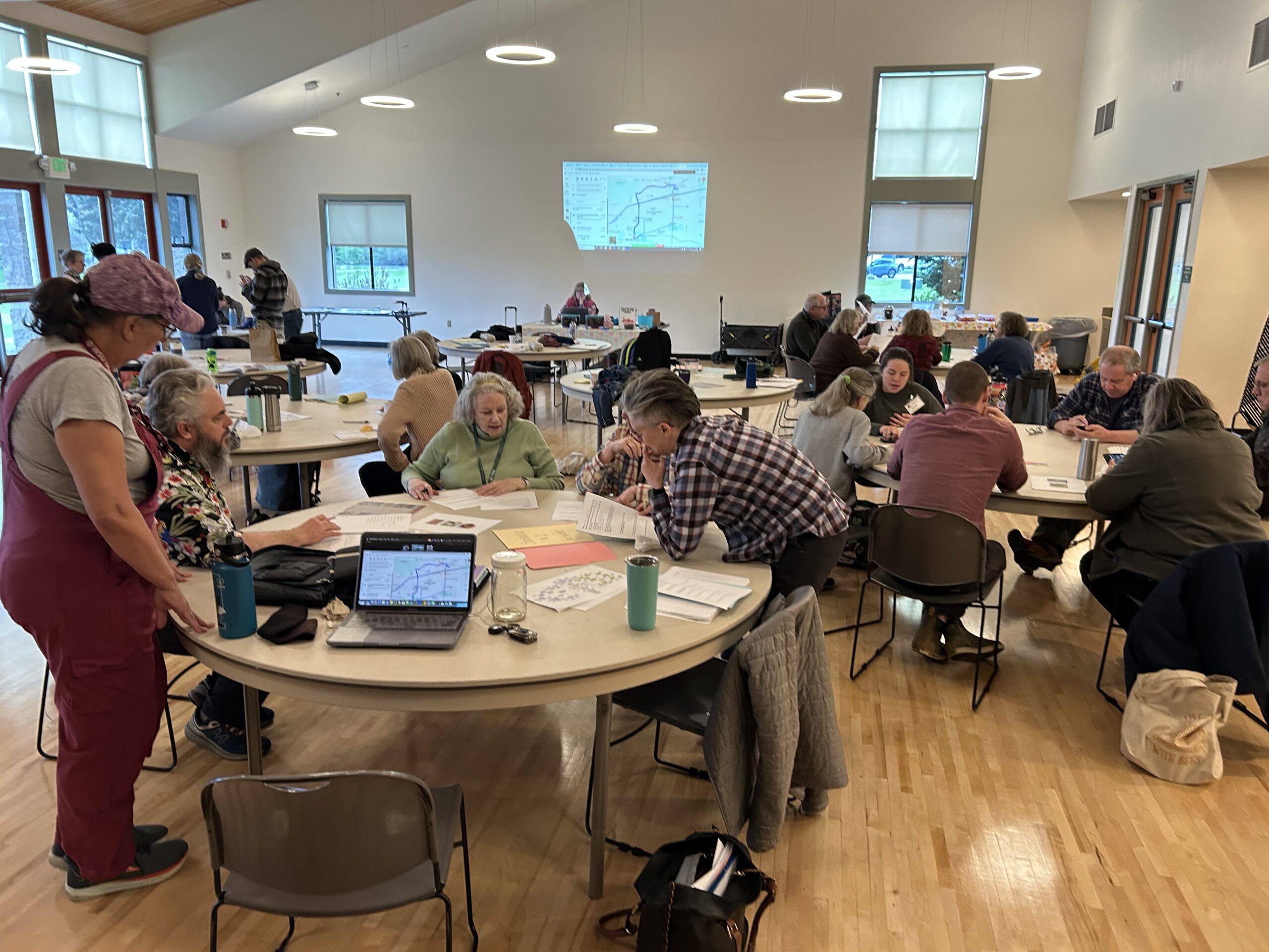 WSU Master Gardener trainees and mentors working on an exercise in the classroom.