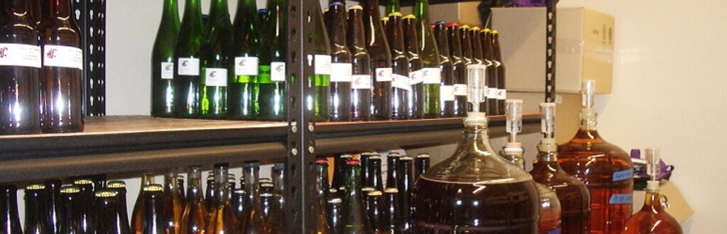 organized glass bottles with labels