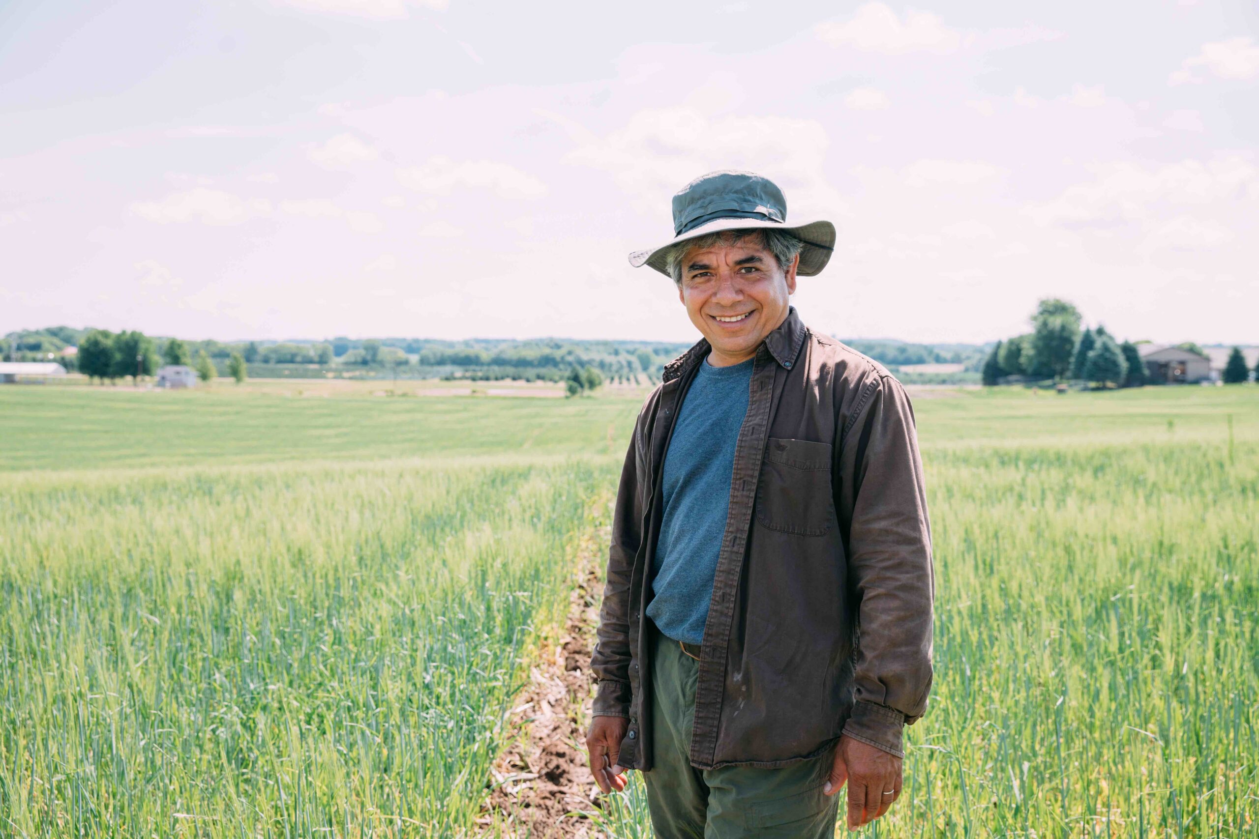 Reginaldo Haslett-Marroquin standing in a field 
