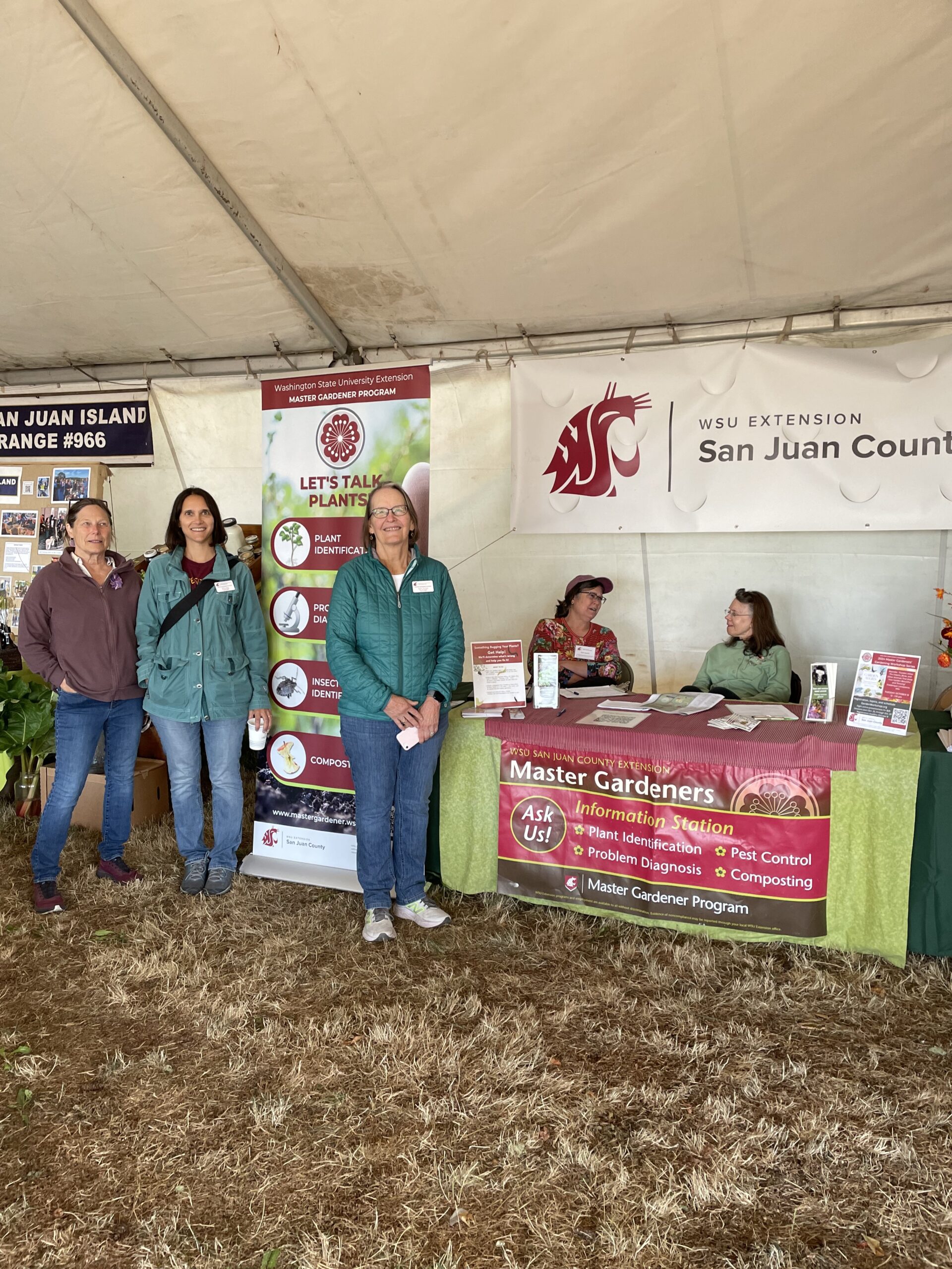 Master Gardeners sitting at an informational table.