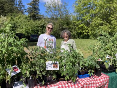 Volunteers welcoming you to the spring plant sale at the Orcas Island Grange