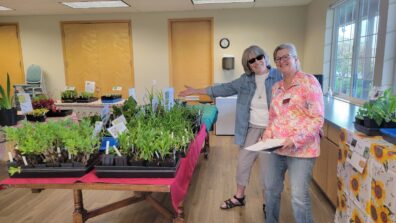 Volunteers welcoming you to the spring plant sale