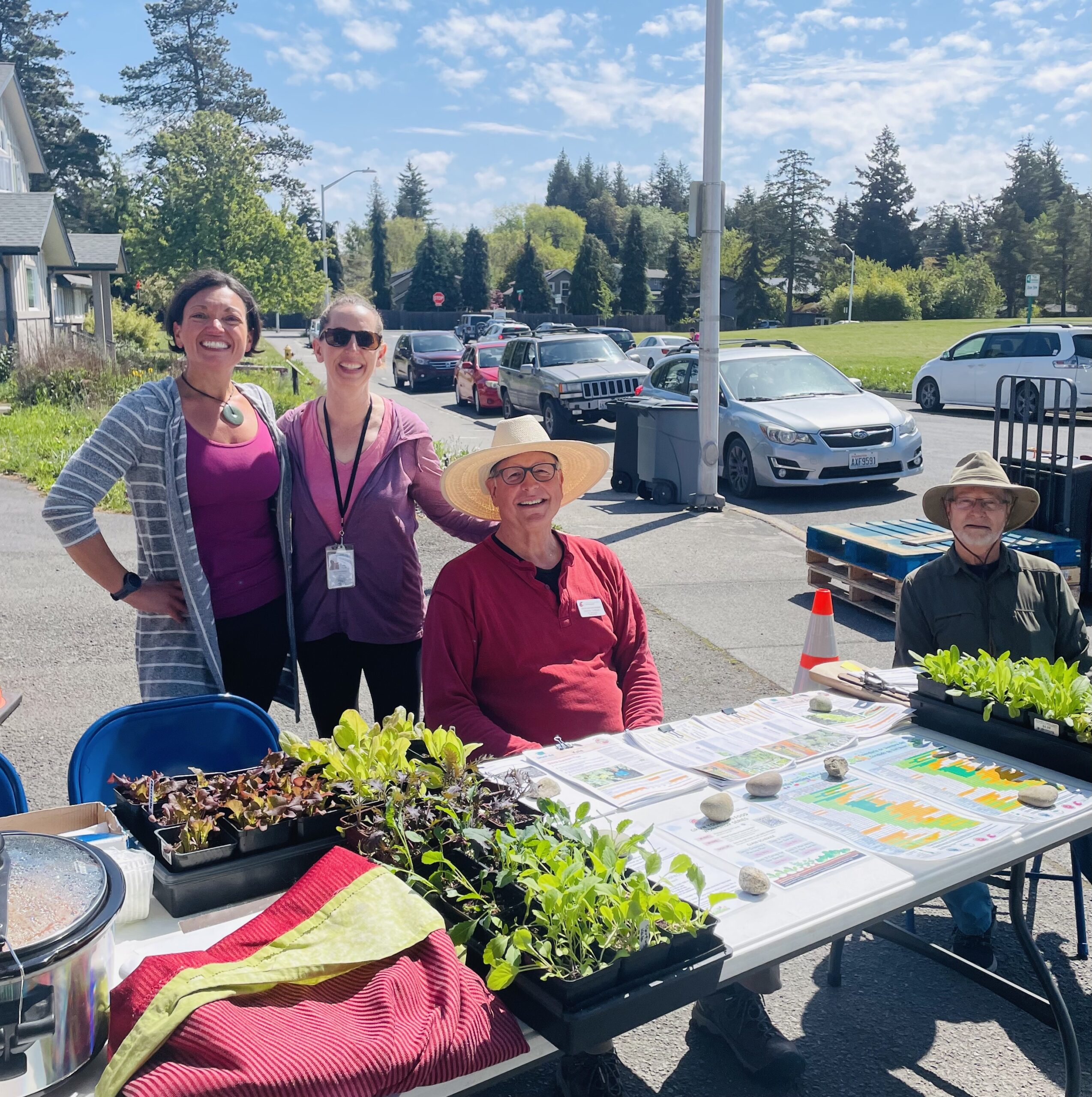 Master Gardeners sitting at an outreach table