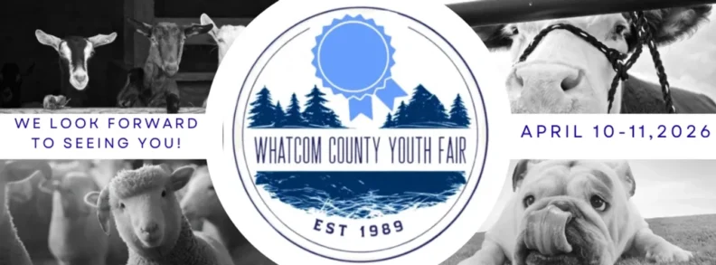A promotional banner for the Whatcom County Youth Fair features a central circular logo with a blue ribbon, evergreen trees, and water, stating "EST 1989". Surrounding the logo are four black-and-white photos of animals: goats, a cow in a halter, sheep, and a bulldog licking its nose. The text on the banner reads, "WE LOOK FORWARD TO SEEING YOU!" and "APRIL 10-11, 2026".