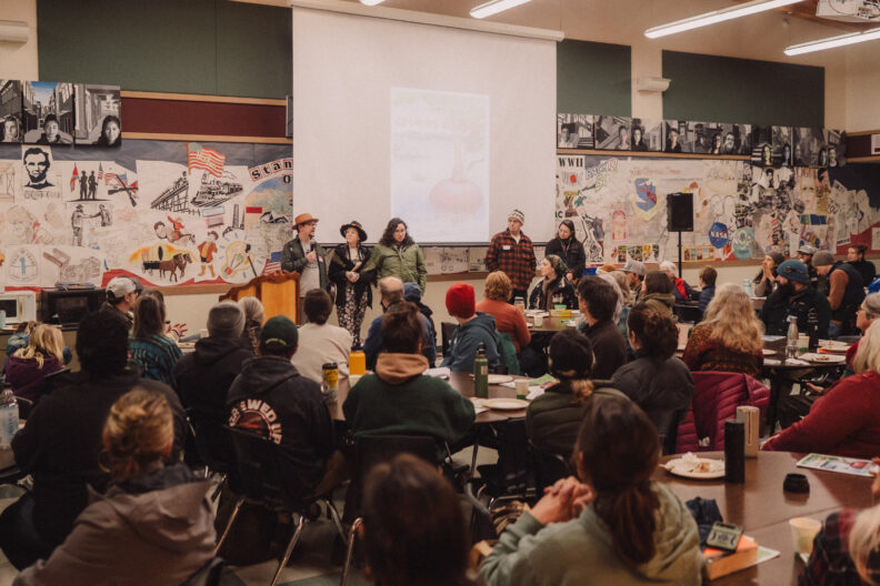 Image of presenters and audience at th opening welcome for the 2026 Ag Summit in the FHHS cafeteria