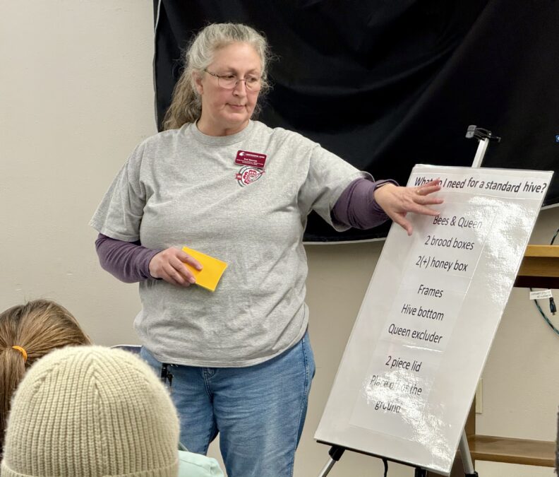 Master Gardener Suzi teaching about beekeeping