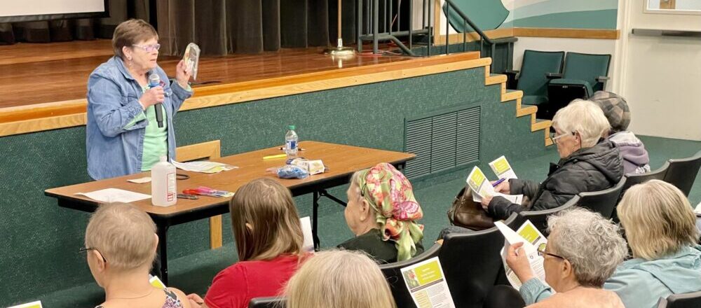 Master Gardener Lavera Wade Teaching how to Grow Tomatoes to an audience in the SCC Auditorium.