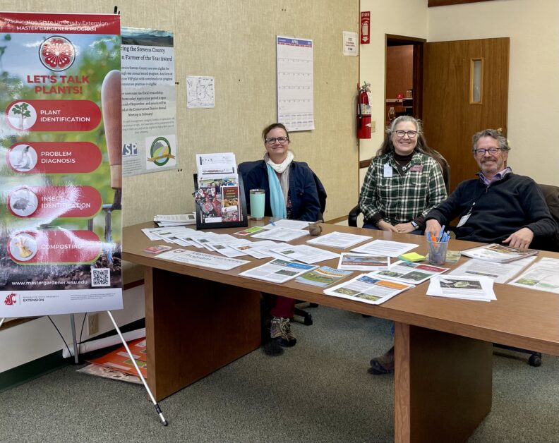 Master Gardeners Laura Patterson, Linda Teller and Phil Teller ready to answer questions at the Stevens County Conservation District Tree Sale pickup event.