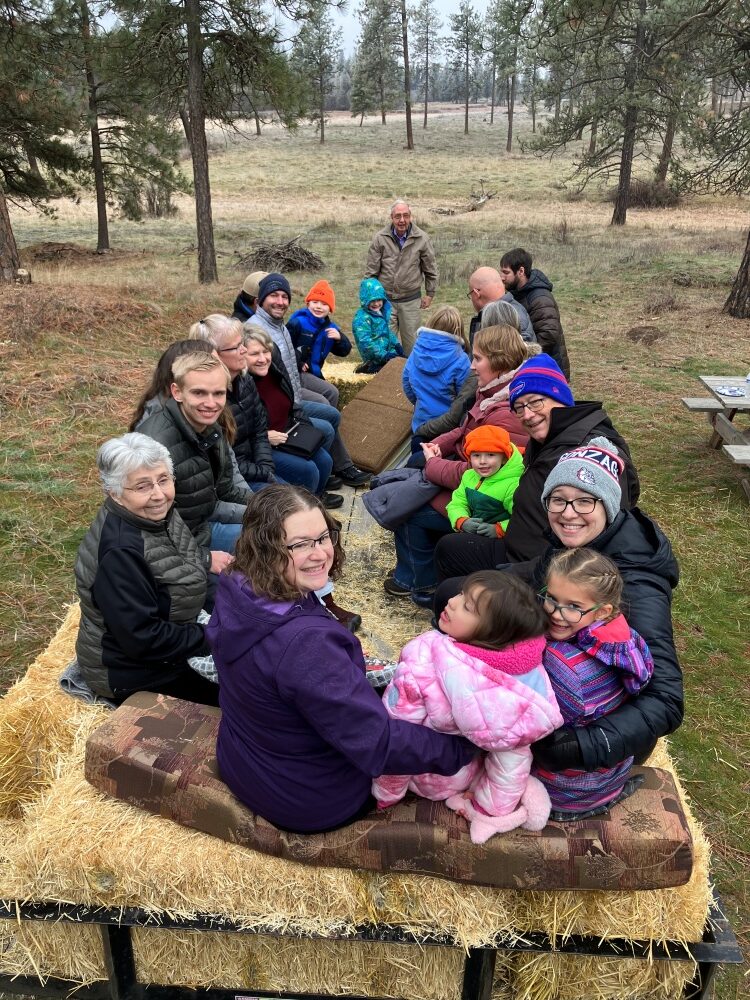 Forest and Range Owners Field Day participants on a hay ride wagon.